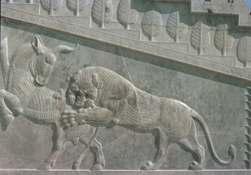 Relief on the East staircase of the Apadana depicting a lion fighting a bull, Achaemenian period